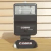 Boxed Cobra Auto 150S Universal Flash Unit. Features Include, Slave Unit, Stand And Original Instructions