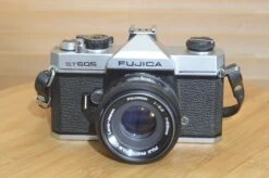 Fujica ST605 SLR With 55mm F2.2 Lens And Case. These Are Very Solid And Striking Vintage Cameras.