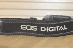Black And Grey Canon EOS Digital Strap. A Lovely Addition To Your Canon Set Up.