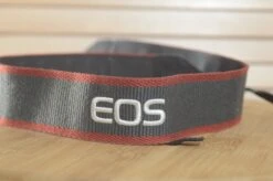 Black And Red Canon EOS Digital Strap. A Lovely Addition To Your Canon Set Up.