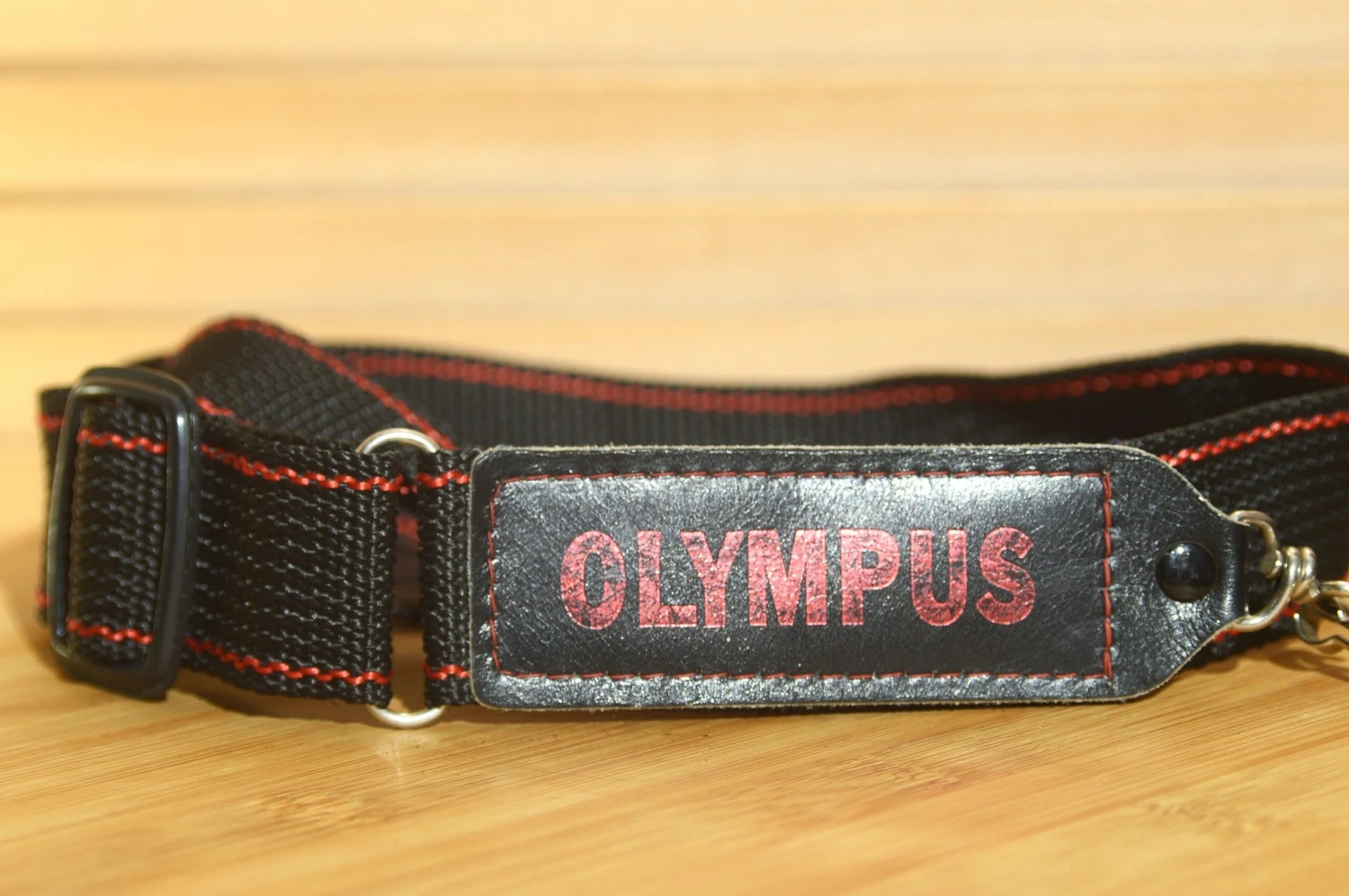 Black And Red Olympus Strap. Lovely Addition To Your Olympus Set Up. 3 Black And Red Olympus Strap. Lovely Addition To Your Olympus Set Up.