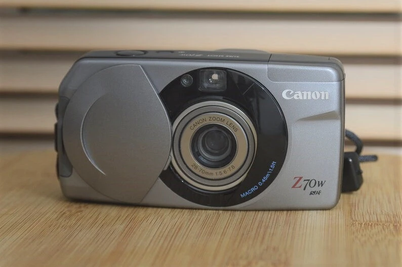 Vintage Canon Sure Shot Z70w Compact Camera With Case. Perfect, Lightweight 35mm To Put In A Pocket, Bag Or Belt Loop. 3 Vintage Canon Sure Shot Z70w Compact Camera With Case. Perfect, Lightweight 35mm To Put In A Pocket, Bag Or Belt Loop.