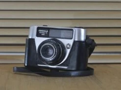 Lovely Sprinty 300 Rare 35mm Camera Working. Easy To Use. Great For Stage Prop Or To Add To Your Collection.