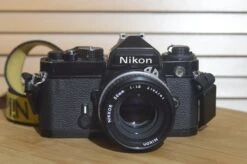 Nikon Black FE With Nikkor 50mm F1.8 Lens Starter Pack. Comes With Lens, Strap And More